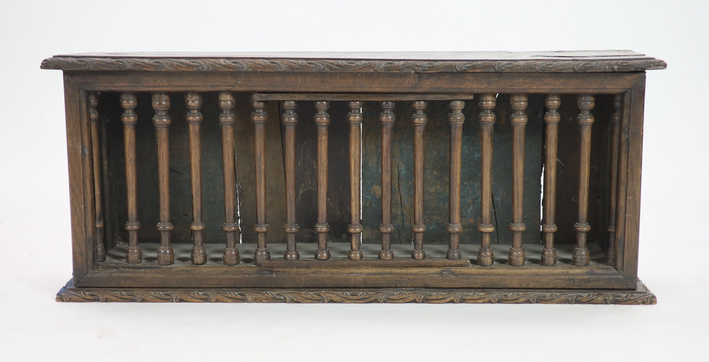 A 17th century oak food cupboard, W.106cm D.23cm H.43cm